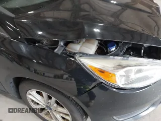 2018 Ford Focus SE with VIN 1FADP3FE8JL209560, listed as a IAAI auction lot 42707236 with 166,017 mi miles and . Bid and sale history available at DreamBid. Image 17.