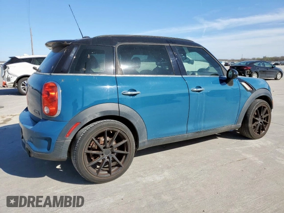 2012 MINI Countryman S with VIN WMWZC3C5XCWM27675, listed as a Copart auction lot 49676205 with 111,499 mi miles and Salvage title. Bid and sale history available at DreamBid. Image 3.
