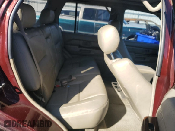 1997 Infiniti QX4 z VIN JNRAR05Y4VW015288, wystawiony jako Copart lot #48034505 z przebiegiem 289 030 mil mil oraz Szkoda całkowita • Salvage title. Historia ofert i sprzedaży dostępna na DreamBid. Obrazek 11.