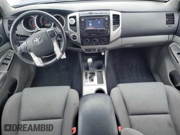 2015 Toyota Tacoma with VIN 3TMLU4EN6FM182144, listed as a Copart auction lot 64000365 with 185,361 mi miles and Clean title. Bid and sale history available at DreamBid. Image 8.