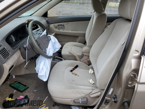 2007 Kia Spectra EX with VIN KNAFE121975420017, listed as a Copart auction lot 51553304 with 96,897 mi miles and Non Repairable. Bid and sale history available at DreamBid. Image 7.