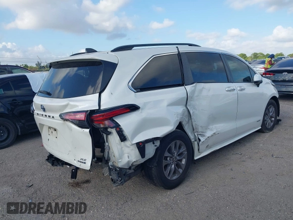 2021 Toyota Sienna XLE with VIN 5TDYRKEC7MS017968, listed as a IAAI auction lot 42145440 with 85,989 mi miles and . Bid and sale history available at DreamBid. Image 4.