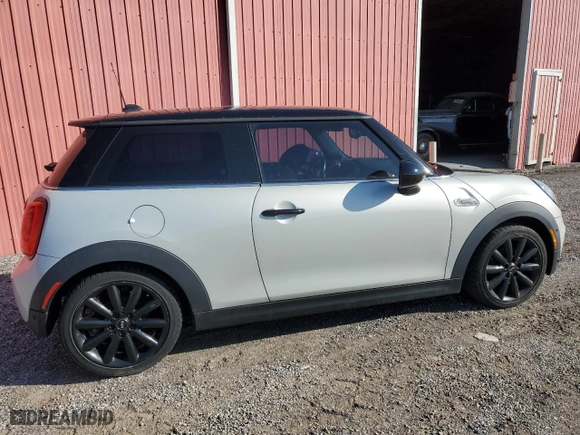 2017 MINI Hardtop 2 Door Cooper with VIN WMWXP5C53H3B77988, listed as a Copart auction lot 52147565 with 130,809 mi miles and Clean Title. Bid and sale history available at carsss.com. Image 3.