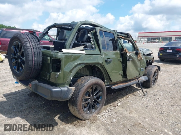 2023 Jeep Wrangler Sahara with VIN 1C4JJXP60PW556336, listed as a IAAI auction lot 39553199 with 10,437 mi miles and . Bid and sale history available at DreamBid. Image 4.