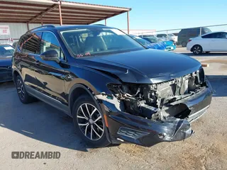 2021 Volkswagen Tiguan SE z VIN 3VV3B7AX0MM080853, wystawiony jako IAAI lot #42406539 z przebiegiem 73 295 mil mil oraz . Historia ofert i sprzedaży dostępna na DreamBid. Obrazek 1.