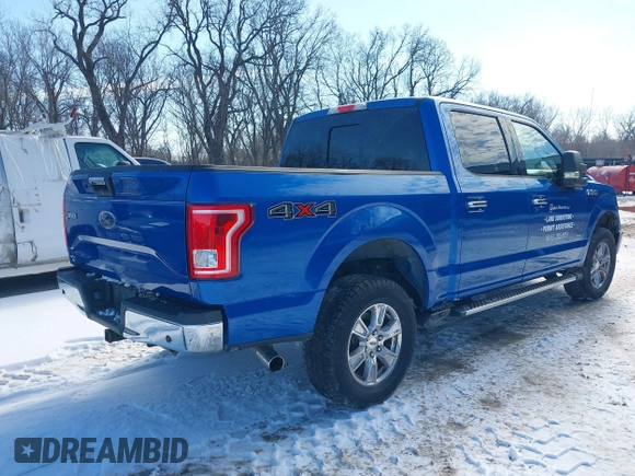2015 Ford F-150 XLT with VIN 1FTEW1EG1FFA87638, listed as a IAAI auction lot 41597302 with 143,400 mi miles. Bid and sale history available at carsss.com. Image 4.