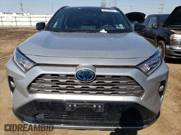 2021 Toyota RAV4 Hybrid XSE with VIN 2T3E6RFV9MW013200, listed as a Copart auction lot 52163255 with 58,336 mi miles and Salvage title. Bid and sale history available at DreamBid. Image 5.