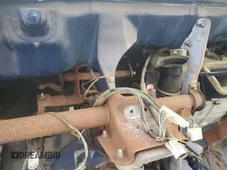 1995 Mitsubishi Mighty Max z VIN JA7LS21G4SP002839, wystawiony jako Copart lot #55777674 z przebiegiem Nie podano mil oraz Tytuł czysty. Historia ofert i sprzedaży dostępna na DreamBid. Obrazek 9.