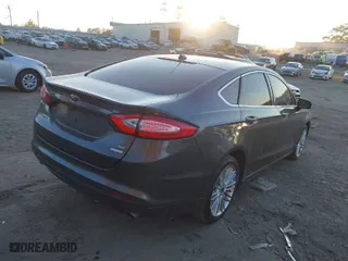 2016 Ford Fusion SE with VIN 3FA6P0HD6GR301773, listed as a IAAI auction lot 41007232 with 98,269 mi miles. Bid and sale history available at carsss.com. Image 4.