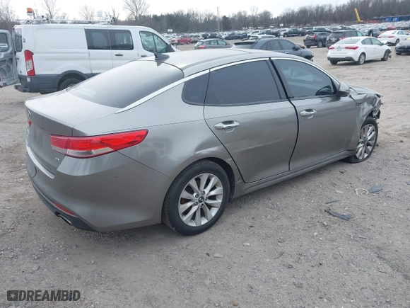 2016 Kia Optima EX with VIN 5XXGU4L33GG108511, listed as a IAAI auction lot 41355565 with 167,111 mi miles. Bid and sale history available at carsss.com. Image 4.