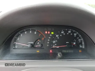 2004 Toyota Camry LE z VIN 4T1BE30K94U892207, wystawiony jako Copart lot #58406245 z przebiegiem 318 751 mil mil oraz Czysty tytuł • Clean title. Historia ofert i sprzedaży dostępna na DreamBid. Obrazek 9.