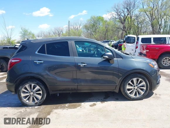 2017 Buick Encore Essence with VIN KL4CJCSB4HB012026, listed as a IAAI auction lot 41974604 with 139,467 mi miles and . Bid and sale history available at carsss.com. Image 13.