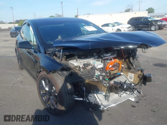 2023 Tesla Model X with VIN 7SAXCDE59PF430836, listed as a IAAI auction lot 41545267 with Not Provided miles and . Bid and sale history available at DreamBid. Image 1.