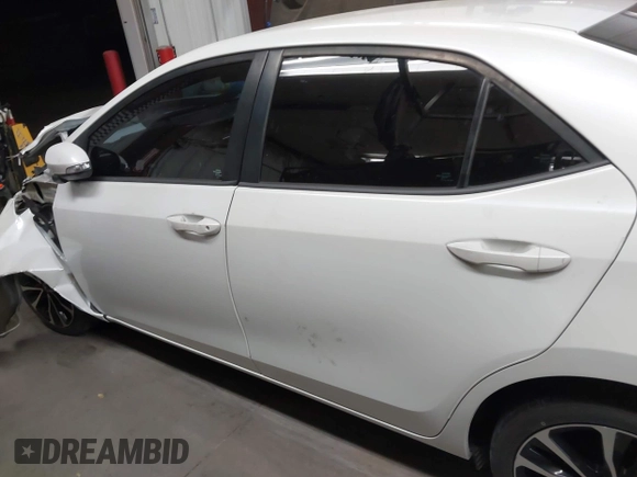 2017 Toyota Corolla L with VIN 5YFBURHE7HP693037, listed as a IAAI auction lot 42304020 with 117,710 mi miles and . Bid and sale history available at DreamBid. Image 15.