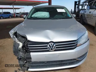 2015 Volkswagen Passat 1.8T Wolfsburg Ed with VIN 1VWAT7A31FC028990, listed as a IAAI auction lot 41778229 with 73,553 mi miles. Bid and sale history available at carsss.com. Image 6.