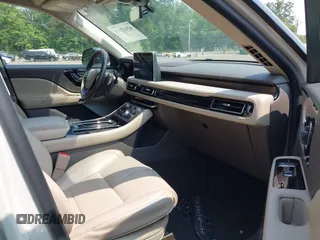 2020 Lincoln Aviator Reserve with VIN 5LM5J7XC8LGL00255, listed as a IAAI auction lot 42413528 with 24,480 mi miles and . Bid and sale history available at DreamBid. Image 5.