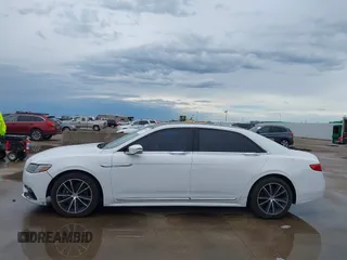 2017 Lincoln Continental Select z VIN 1LN6L9SK5H5616680, wystawiony jako IAAI lot #42465865 z przebiegiem 86 686 mil mil oraz . Historia ofert i sprzedaży dostępna na DreamBid. Obrazek 14.