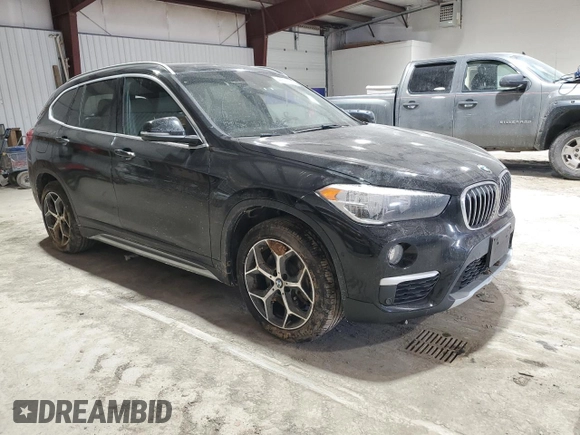 2018 BMW X1 xDrive28i with VIN WBXHT3C37J5L30341, listed as a Copart auction lot 42691505 with 84,523 mi miles and Salvage Title. Bid and sale history available at carsss.com. Image 4.