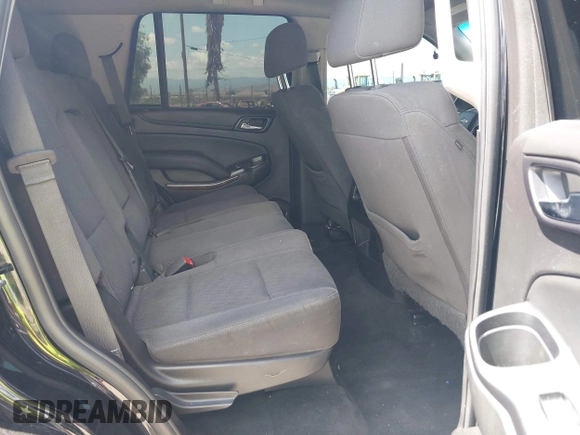 2018 Chevrolet Tahoe LS with VIN 1GNSCAKC9JR183853, listed as a IAAI auction lot 42254267 with 87,351 mi miles and . Bid and sale history available at DreamBid. Image 8.