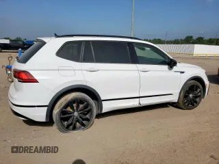 2021 Volkswagen Tiguan SE z VIN 3VV3B7AX9MM003432, wystawiony jako Copart lot #63422315 z przebiegiem 64 531 mil mil oraz Czysty tytuł • Clean title. Historia ofert i sprzedaży dostępna na DreamBid. Obrazek 3.