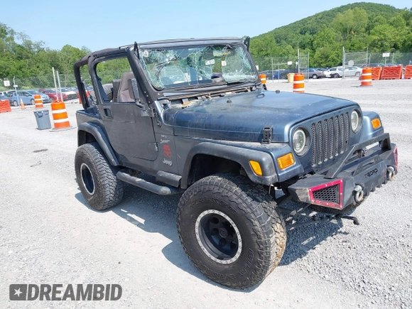 2001 Jeep Wrangler Sport z VIN 1J4FA49S11P322636, wystawiony jako IAAI lot #42409917 z przebiegiem 88 675 mil mil oraz . Historia ofert i sprzedaży dostępna na DreamBid. Obrazek 1.
