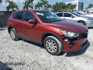 2013 Mazda CX-5 Touring with VIN JM3KE4CE5D0164060, listed as a Copart auction lot 57113875 with 83,262 mi miles and Salvage Title. Bid and sale history available at DreamBid. Image 4.