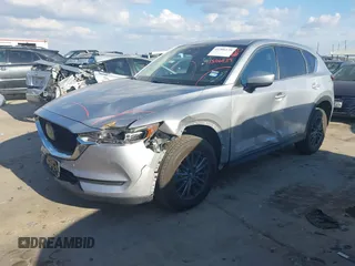 2020 Mazda CX-5 Touring with VIN JM3KFACMXL1786200, listed as a IAAI auction lot 41506139 with 121,944 mi miles. Bid and sale history available at carsss.com. Image 18.