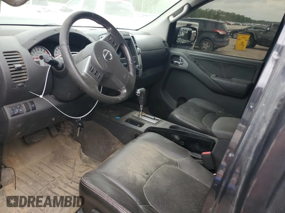 2012 Nissan Frontier Pro-4X with VIN 1N6AD0EVXCC415470, listed as a Copart auction lot 50650915 with 157,160 mi miles and Salvage title. Bid and sale history available at DreamBid. Image 7.
