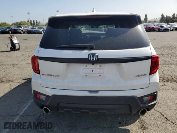 2023 Honda Passport EX-L with VIN 5FNYF8H58PB014241, listed as a Copart auction lot 55176105 with 16,672 mi miles and Salvage title. Bid and sale history available at DreamBid. Image 6.