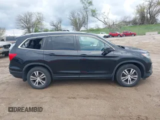 2017 Honda Pilot EX-L with VIN 5FNYF6H51HB045854, listed as a IAAI auction lot 42178053 with 114,913 mi miles and . Bid and sale history available at DreamBid. Image 14.