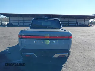 2024 Rivian R1T Adventure z VIN 7FCTGAAA5RN033799, wystawiony jako IAAI lot #41606562 z przebiegiem 9 449 mil mil oraz . Historia ofert i sprzedaży dostępna na DreamBid. Obrazek 16.
