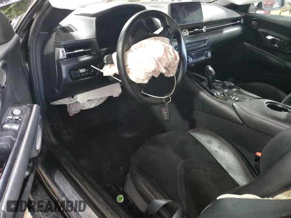 2021 Toyota GR Supra 2.0 with VIN WZ1DB2C0XMW044031, listed as a Copart auction lot 47204675 with 0 mi miles and Salvage Title. Bid and sale history available at carsss.com. Image 8.