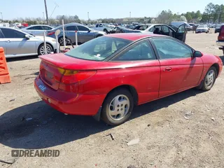 2002 Saturn SC with VIN 1G8ZY12792Z127824, listed as a IAAI auction lot 41760132 with 80,908 mi miles. Bid and sale history available at carsss.com. Image 4.