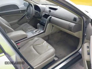 2003 Infiniti G35 w/Leather with VIN JNKCV51E23M300480, listed as a IAAI auction lot 41447349 with 282,507 mi miles. Bid and sale history available at carsss.com. Image 5.