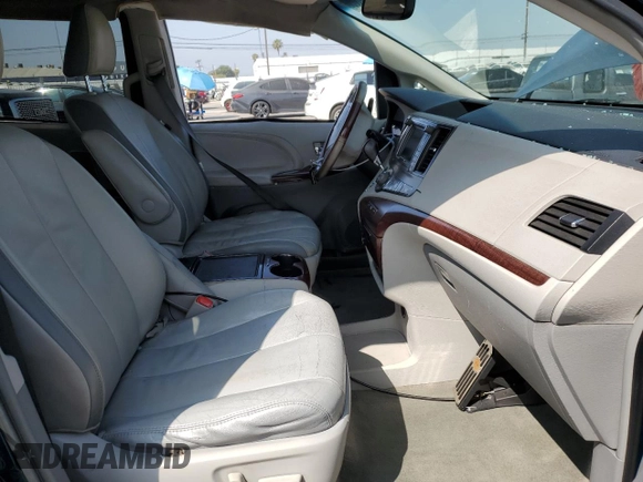 2012 Toyota Sienna XLE AAS with VIN 5TDYK3DC8CS224654, listed as a Copart auction lot 60927385 with 161,282 mi miles and Salvage title. Bid and sale history available at DreamBid. Image 7.