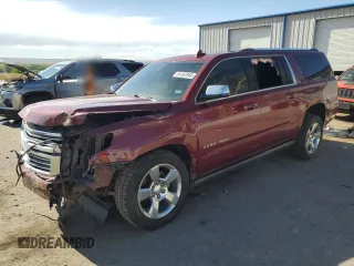 2016 Chevrolet Suburban LTZ with VIN 1GNSKJKC1GR157789, listed as a Copart auction lot 54162945 with 132,015 mi miles and Salvage title. Bid and sale history available at DreamBid. Image 1.