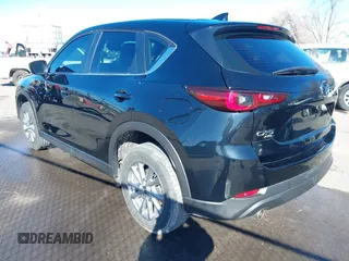 2023 Mazda CX-5 2.5 S with VIN JM3KFBAM9P0230299, listed as a IAAI auction lot 41656657 with 17,290 mi miles. Bid and sale history available at carsss.com. Image 3.
