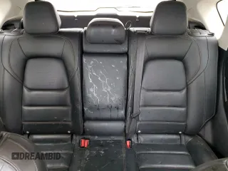 2021 Mazda CX-5 Grand Touring z VIN JM3KFADM7M1339081, wystawiony jako Copart lot #58913585 z przebiegiem Nie podano mil oraz Szkoda całkowita • Salvage title. Historia ofert i sprzedaży dostępna na DreamBid. Obrazek 10.
