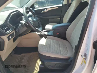 2021 Ford Escape SE z VIN 1FMCU0G69MUA86107, wystawiony jako Copart lot #57448275 z przebiegiem 34 925 mil mil oraz Szkoda całkowita • Salvage title. Historia ofert i sprzedaży dostępna na DreamBid. Obrazek 7.