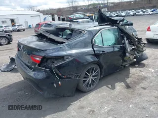 2022 Toyota Camry SE with VIN 4T1G11AK4NU620878, listed as a IAAI auction lot 41931362 with 81,761 mi miles. Bid and sale history available at carsss.com. Image 4.