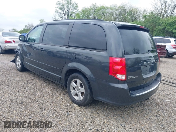 2012 Dodge Grand Caravan SXT with VIN 2C4RDGCG7CR236328, listed as a IAAI auction lot 42170991 with 72,831 mi miles and . Bid and sale history available at DreamBid. Image 3.