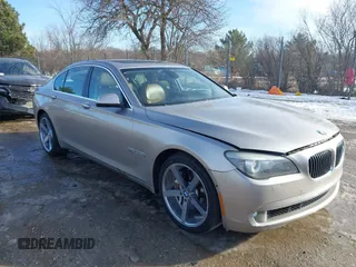 2012 BMW 7 Series 740i with VIN WBAKA4C58CDS99381, listed as a IAAI auction lot 41655715 with 112,731 mi miles. Bid and sale history available at carsss.com. Image 1.