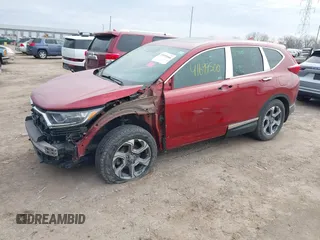 2018 Honda CR-V EX with VIN 2HKRW1H52JH523178, listed as a IAAI auction lot 41699500 with 81,377 mi miles and . Bid and sale history available at carsss.com. Image 2.