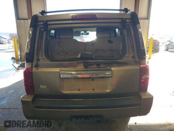 2006 Jeep Commander Limited z VIN 1J8HG58N86C305693, wystawiony jako Copart lot #80289634 z przebiegiem 158 711 mil mil oraz Szkoda całkowita • Salvage title. Historia ofert i sprzedaży dostępna na DreamBid. Obrazek 6.