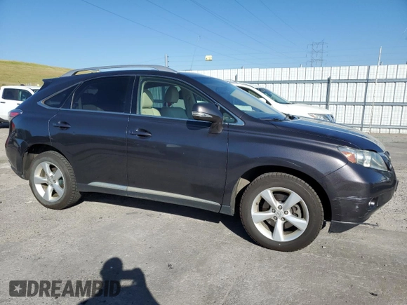 2010 Lexus RX 350 with VIN JTJBK1BA0A2406779, listed as a Copart auction lot 63318705 with 174,738 mi miles and Clean title. Bid and sale history available at DreamBid. Image 4.