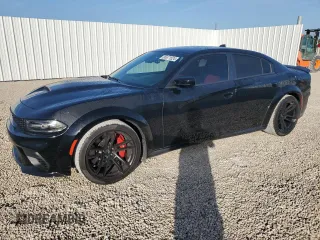 2021 Dodge Charger Scat Pack Widebody with VIN 2C3CDXGJ5MH637464, listed as a Copart auction lot 85671524 with 101,343 mi miles and Salvage Title. Bid and sale history available at carsss.com. Image 1.