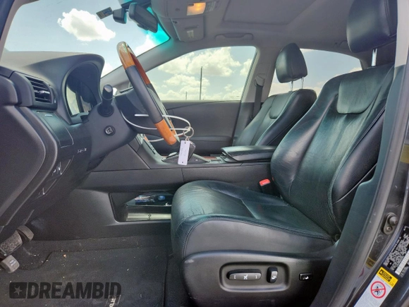 2010 Lexus RX 350 with VIN 2T2ZK1BA6AC037084, listed as a Copart auction lot 62074835 with 143,795 mi miles and Salvage title. Bid and sale history available at DreamBid. Image 7.