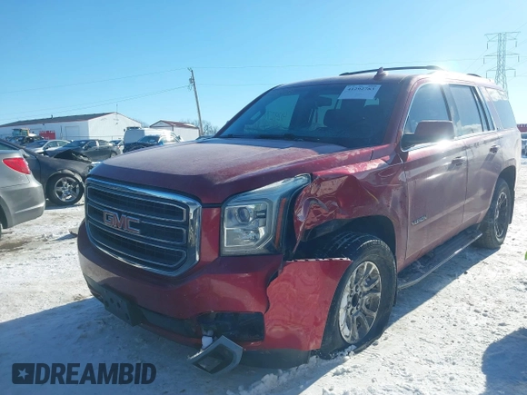 2015 GMC Yukon SLE with VIN 1GKS2AKC2FR514005, listed as a IAAI auction lot 41292783 with 129,413 mi miles. Bid and sale history available at carsss.com. Image 6.