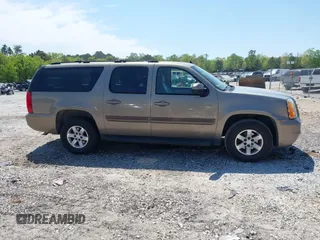 2007 GMC Yukon XL SLT z VIN 1GKFC16087J200390, wystawiony jako IAAI lot #42049673 z przebiegiem 169 174 mil mil oraz . Historia ofert i sprzedaży dostępna na DreamBid. Obrazek 13.