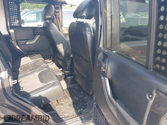 2016 Jeep Wrangler Unlimited Sport with VIN 1C4BJWDG9GL211030, listed as a IAAI auction lot 42459945 with 61,671 mi miles and . Bid and sale history available at DreamBid. Image 8.